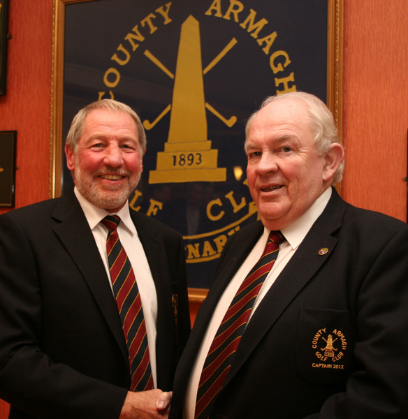 Handing over the reins at County Armagh Golf Club, outgoing Captain Brendan Smyth (right) welcomes in the new Club Captain John Flack