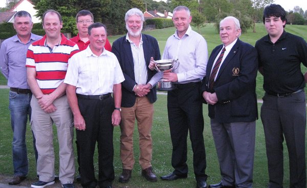 Philip White presents the Henry White Memorial Cup to Brian Loney, winner of the annual stroke competition at County Armagh Golf Club which is sponsored by Philip White Tyres. Pictured also are Club Past Captain Brendan Smith and runner-u prize winners Sean Dougan, Ian Millar, Andrew McTaggart, Tommy Mackin and John Maguire