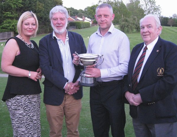 Philip White presents the Henry White Memorial Cup to Killylea man Brian Loney, winner of the annual stroke competition at County Armagh Golf Club which is sponsored by Philip White Tyres. Included also are Philip’s partner Fiona Hughes, and Club Past Captain Brendan Smith
